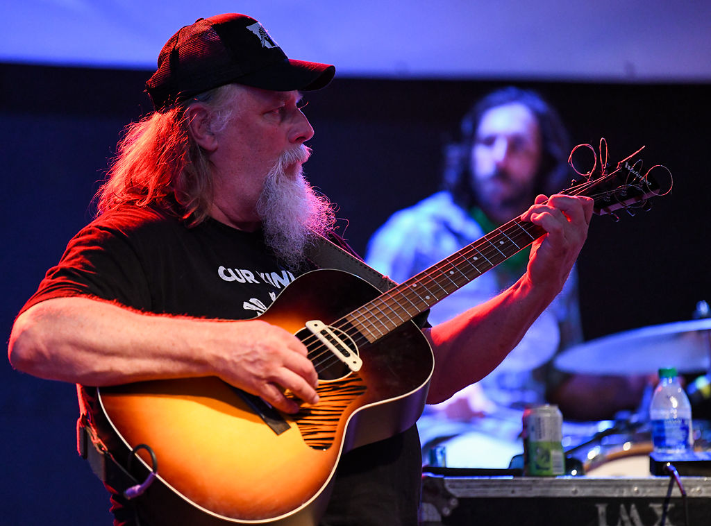 Dave Dearnley, a guitarist with The Daves, plays